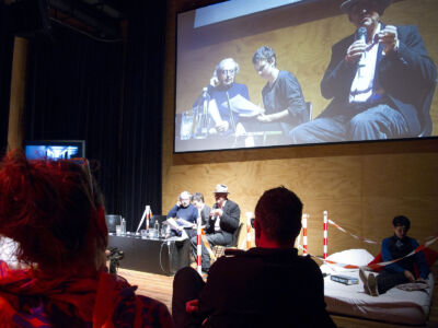 Talkshow "Matrix-Ville: What is Real/Virtual", with Gian Piero Frassinelli (Superstudio), Saskia van Stein (curator NAi), Tjebbe van Tijen (Imaginary Museum), Piet Vollaard (architect and publicist), hosted by Peter T. Lang (architect and publicist).