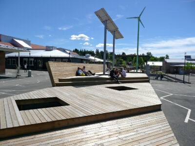 Energy Farm: wooden structure, solar panels, wind turbine